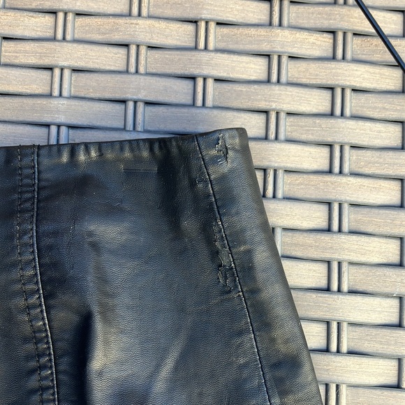 Free People faux leather mini skirt.  Fully lined.  Zips in the back.  Cute on! - Picture 6 of 9